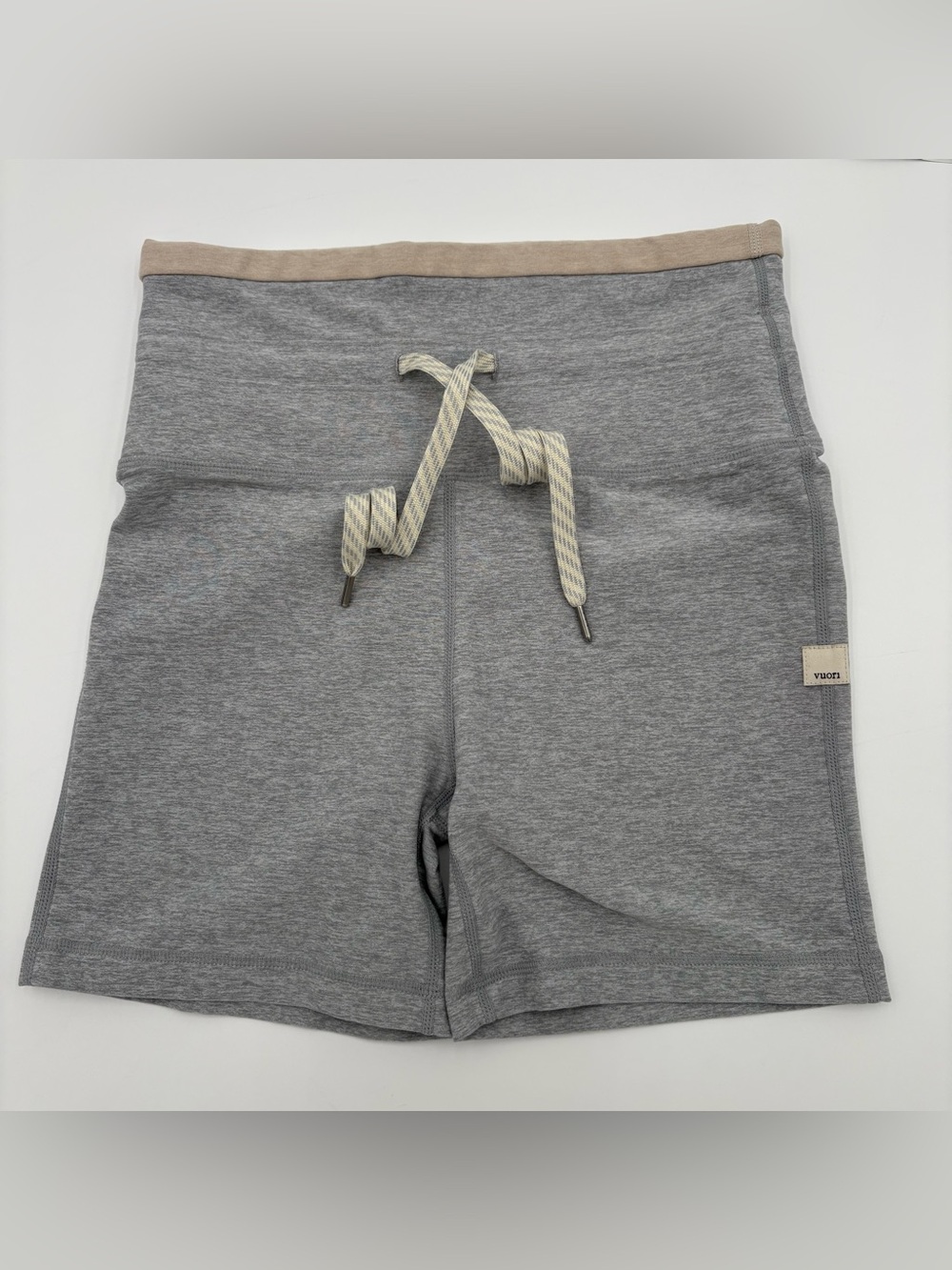 Vuori Women's Halo Performance Shorts in Pale Grey Heather.